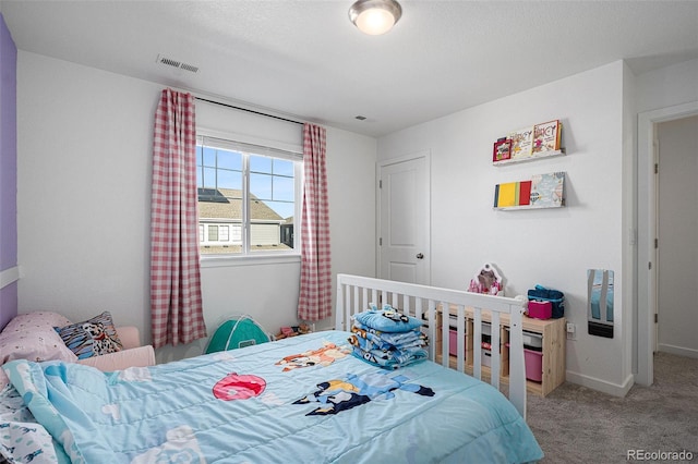 bedroom featuring carpet flooring