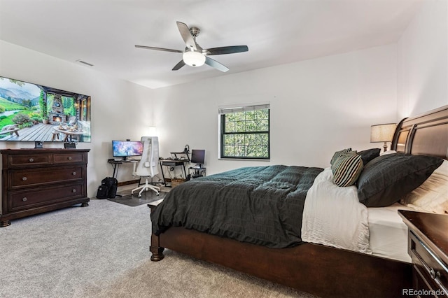 7250 Eastmoor Dr Unit 122, Denver, CO 80237 - bedroom featuring carpet and a ceiling fan