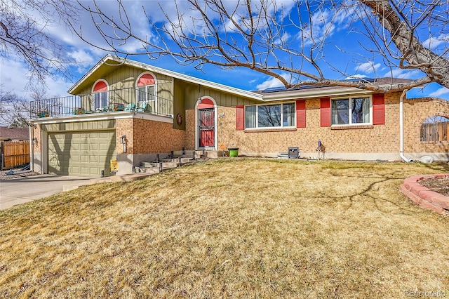 single story home with driveway, brick siding, an attached garage, and a balcony