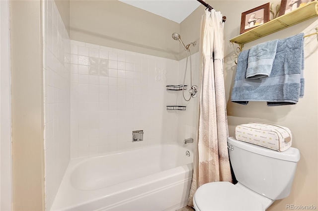 full bathroom with shower / tub combo with curtain and toilet