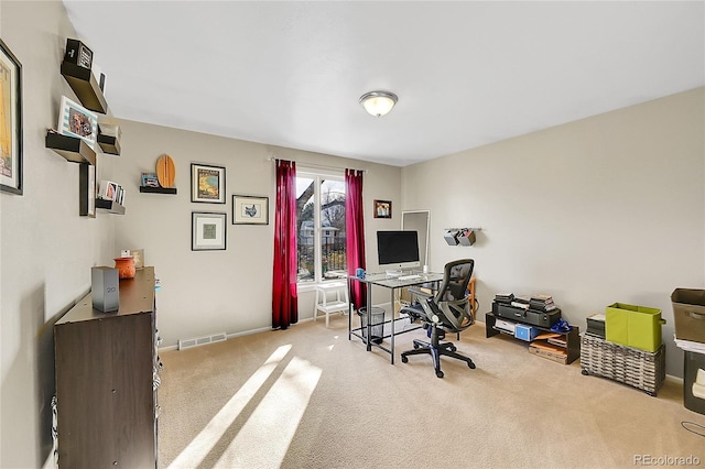 office space featuring carpet and visible vents