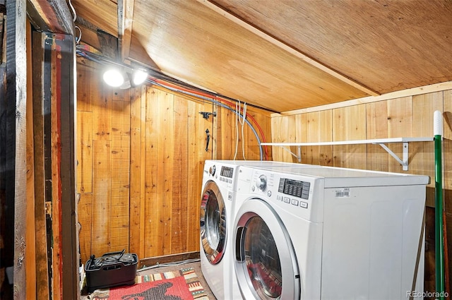 1634 Caribou Rd, Nederland, CO 80466 - washroom with wood walls, washing machine and clothes dryer, and wooden ceiling