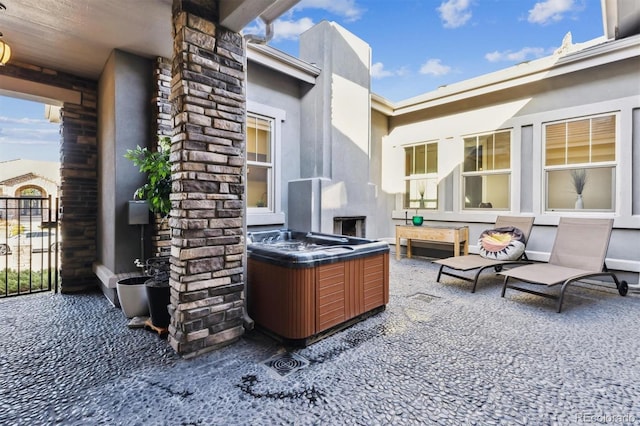 view of patio featuring a hot tub