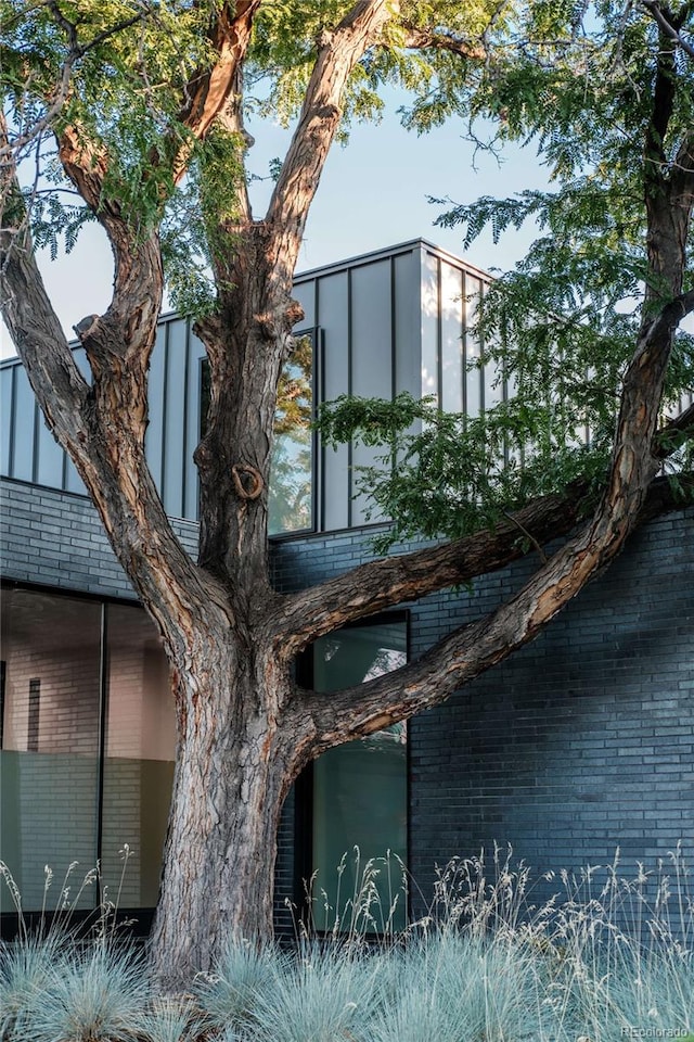 view of home's exterior featuring brick siding