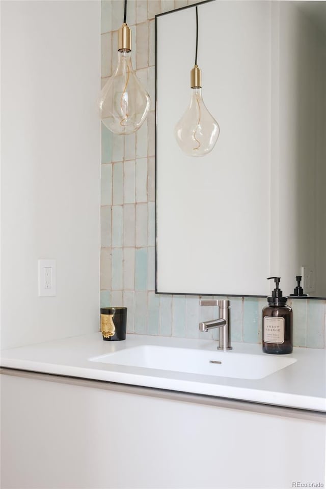 bathroom with tile walls and vanity