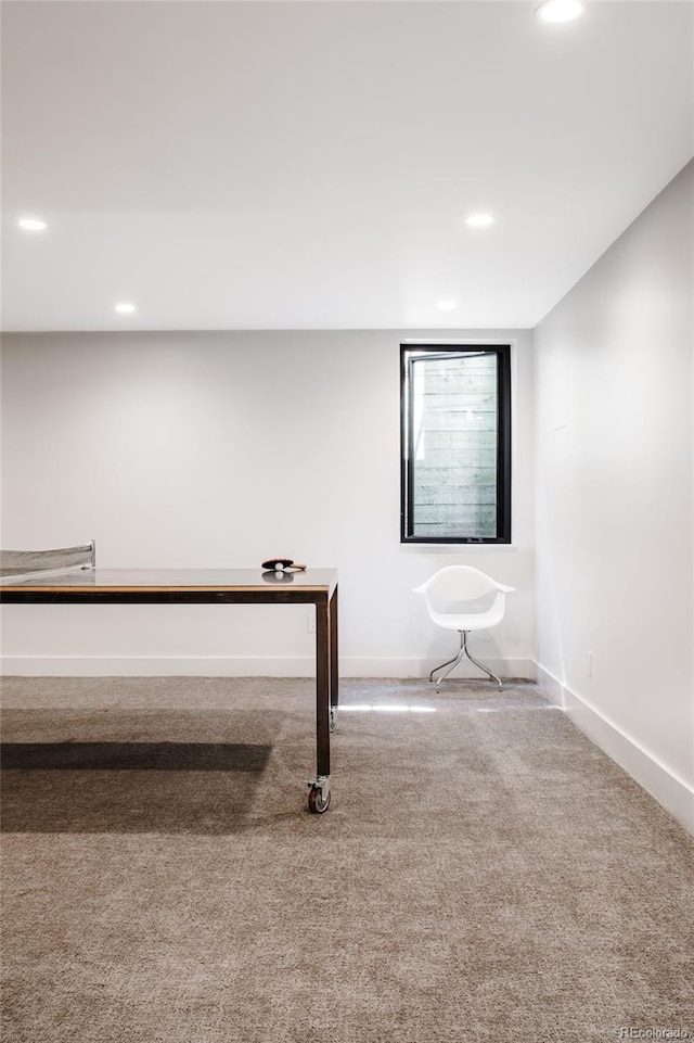 interior space featuring recessed lighting, baseboards, and carpet floors