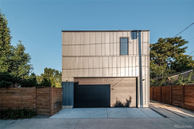 garage featuring fence