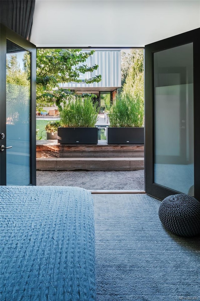 doorway to outside featuring plenty of natural light