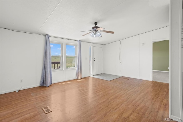 7855 Edison Rd, Yoder, CO 80864 - unfurnished room featuring a ceiling fan and light wood-style floors