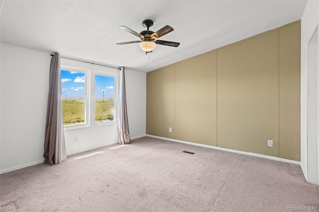 7855 Edison Rd, Yoder, CO 80864 - spare room with ceiling fan and light carpet