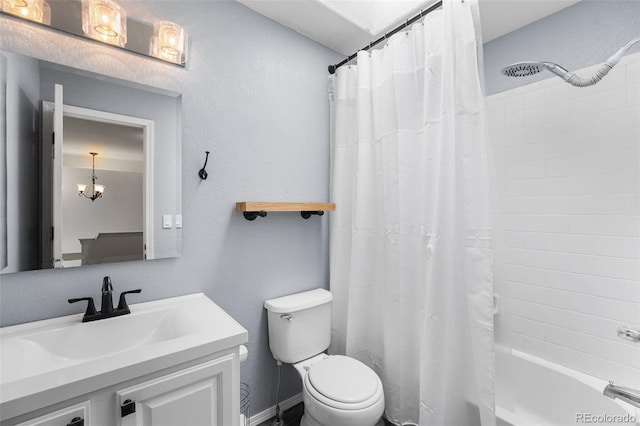 429 Arrowhead Dr, Loveland, CO 80537 - full bathroom featuring toilet, shower / bath combination with curtain, vanity, and a chandelier