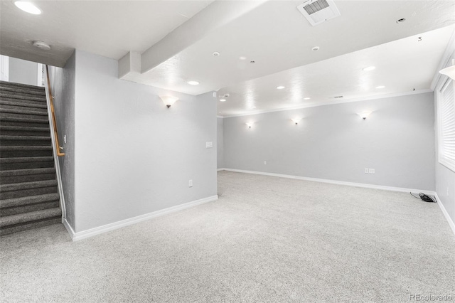 429 Arrowhead Dr, Loveland, CO 80537 - finished below grade area with carpet, stairway, baseboards, recessed lighting, and ornamental molding
