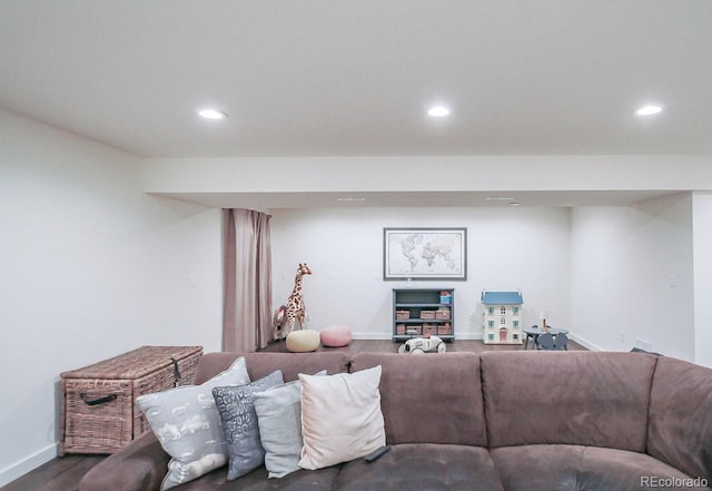 living room with baseboards, dark wood-style flooring, and recessed lighting