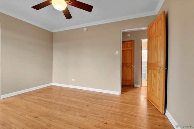 unfurnished room with light wood-style floors, baseboards, ornamental molding, and ceiling fan