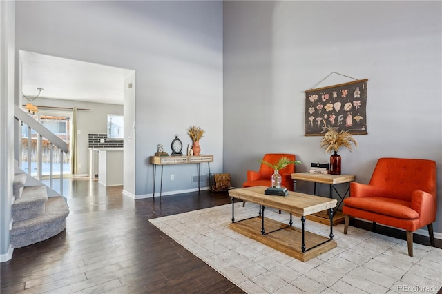 sitting room featuring wood-type flooring