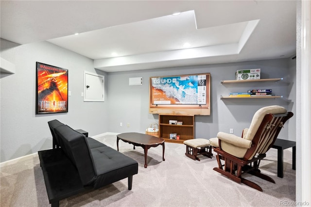 sitting room with carpet floors