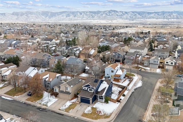 birds eye view of property featuring a mountain view