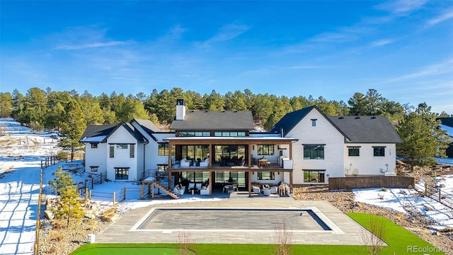 rear view of house featuring a patio