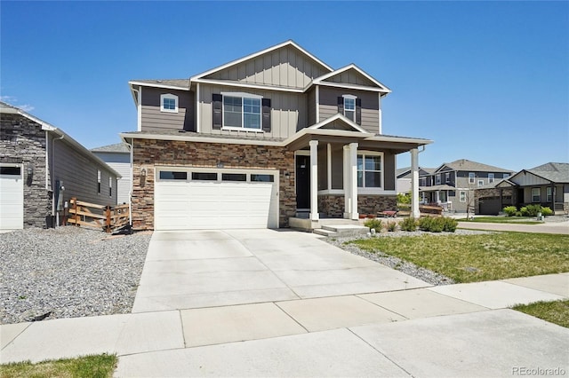 craftsman inspired home with board and batten siding, stone siding, an attached garage, concrete driveway, and a porch