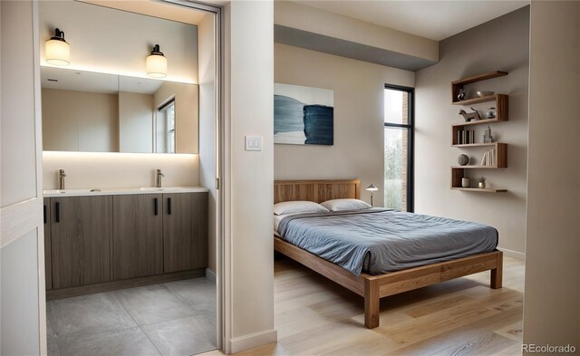 1643 Boulder St Unit 211, Denver, CO 80211 - bedroom with light wood finished floors and a sink
