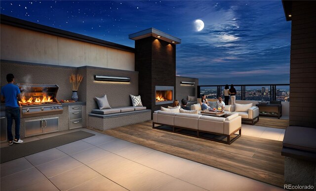 1643 Boulder St Unit 211, Denver, CO 80211 - exterior space with an outdoor living space with a fireplace