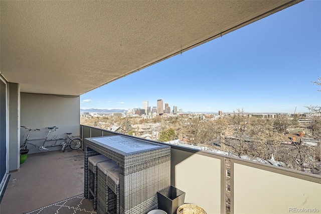 balcony featuring a city view