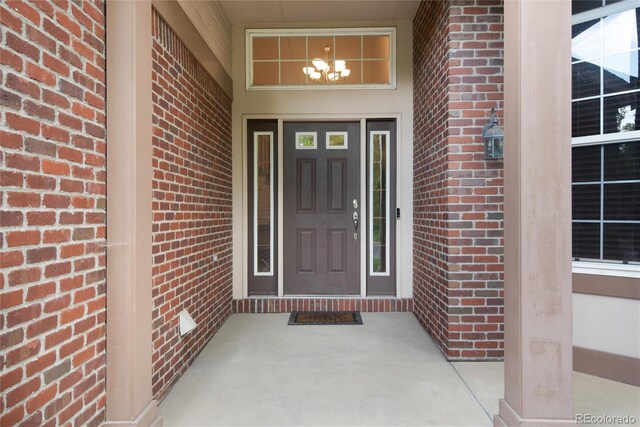 2959 W 110th Pl, Westminster, CO 80234 - entrance to property featuring brick siding and a porch