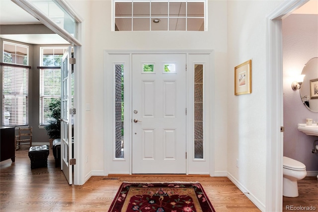 2959 W 110th Pl, Westminster, CO 80234 - entryway with light wood-style flooring and baseboards