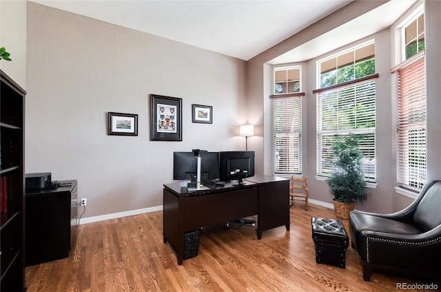 2959 W 110th Pl, Westminster, CO 80234 - office area featuring wood finished floors and baseboards