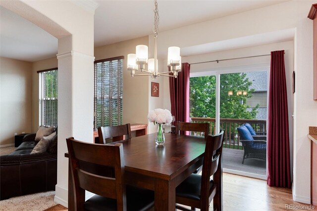 2959 W 110th Pl, Westminster, CO 80234 - dining room featuring a chandelier, healthy amount of natural light, and baseboards
