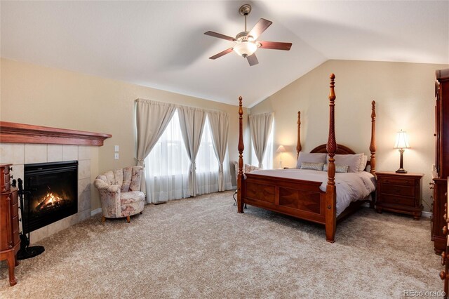 2959 W 110th Pl, Westminster, CO 80234 - bedroom featuring a tile fireplace, carpet, lofted ceiling, and a ceiling fan