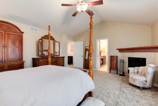 2959 W 110th Pl, Westminster, CO 80234 - bedroom with a tiled fireplace, lofted ceiling, carpet flooring, ensuite bath, and a ceiling fan