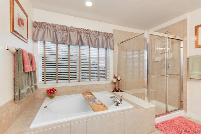 2959 W 110th Pl, Westminster, CO 80234 - bathroom featuring a garden tub and a shower stall