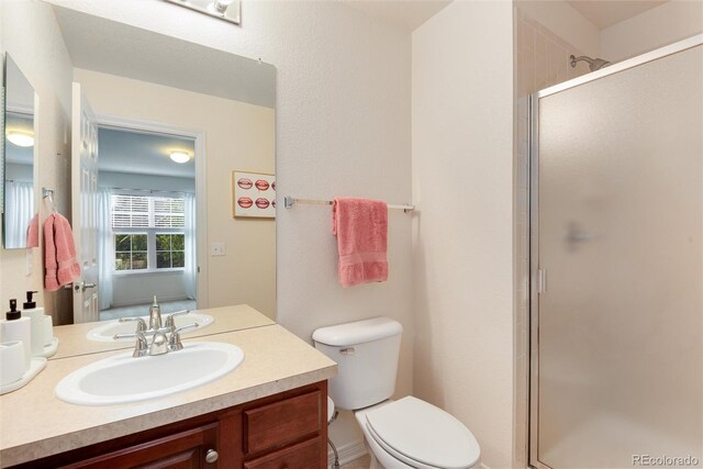 2959 W 110th Pl, Westminster, CO 80234 - full bath with a shower stall, vanity, and toilet