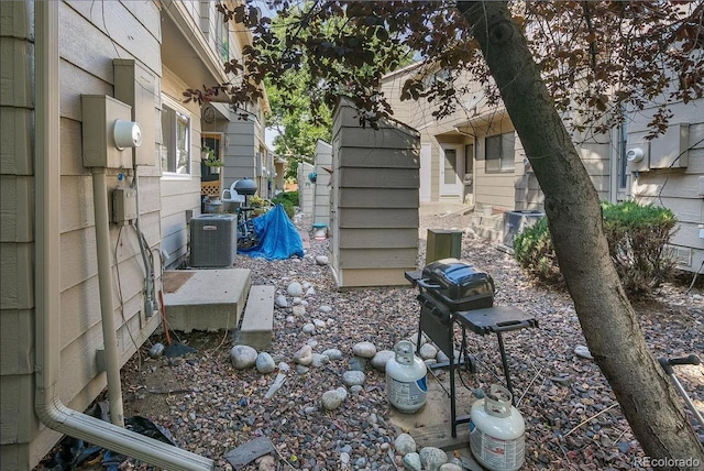 exterior space featuring cooling unit