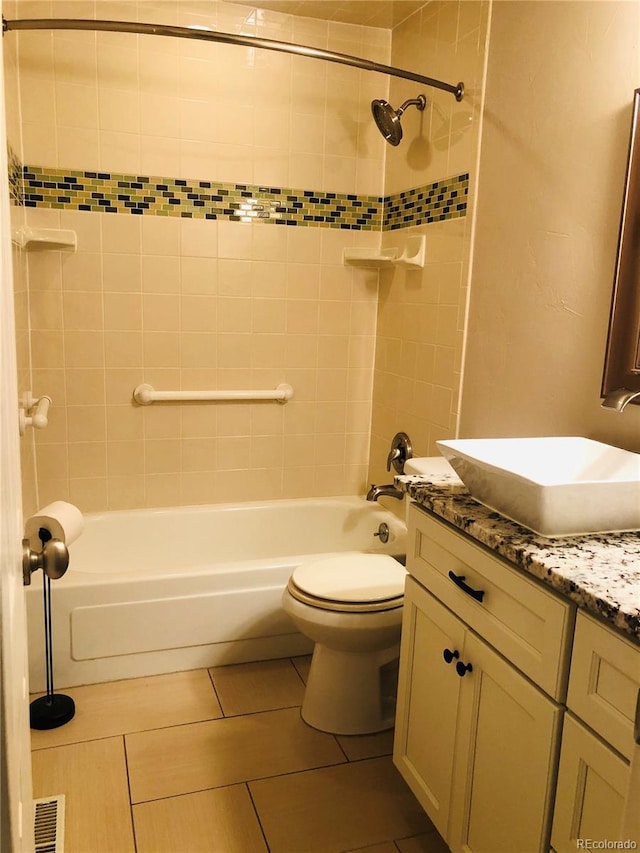 full bath with toilet, visible vents, shower / bath combination, and vanity