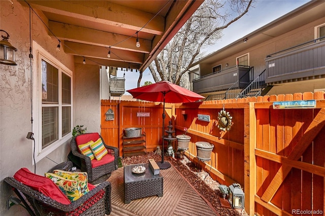 view of patio featuring a fenced backyard and an outdoor hangout area