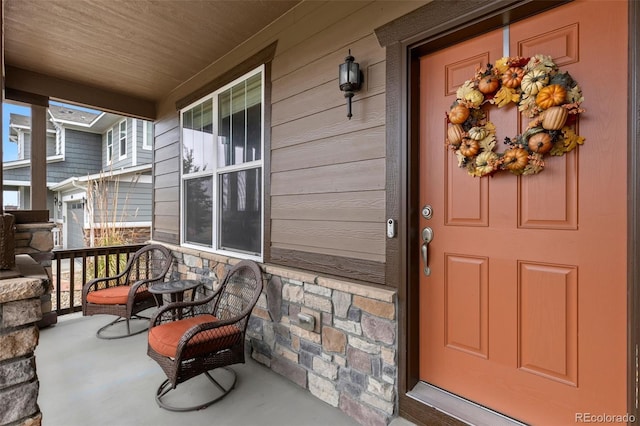 entrance to property with covered porch