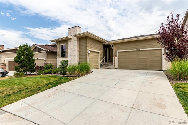 17490 W 94th Dr, Arvada, CO 80007 - single story home featuring a garage, a chimney, concrete driveway, and a front lawn