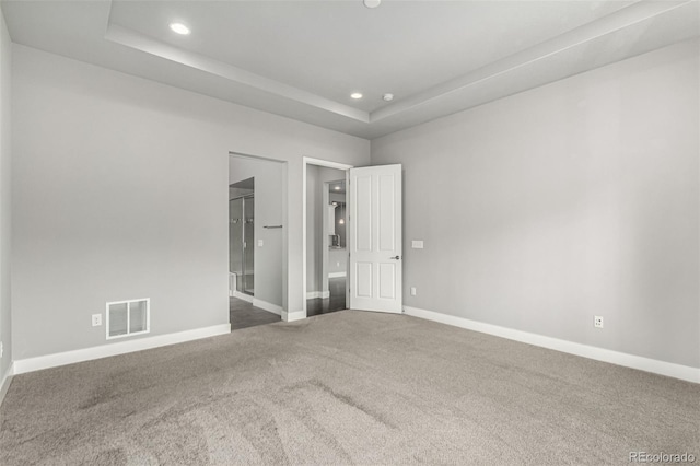 17490 W 94th Dr, Arvada, CO 80007 - unfurnished bedroom featuring carpet, a raised ceiling, and recessed lighting