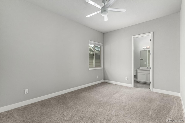 17490 W 94th Dr, Arvada, CO 80007 - unfurnished bedroom featuring light colored carpet, connected bathroom, and ceiling fan
