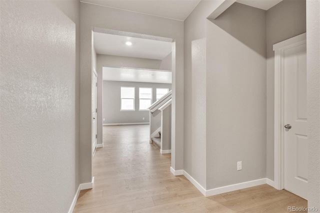 corridor featuring light hardwood / wood-style flooring