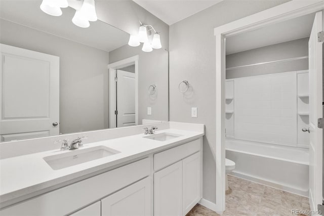 full bathroom with vanity, toilet, and  shower combination