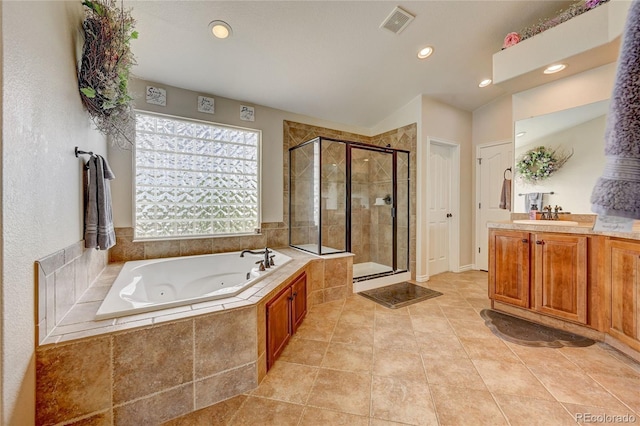 4864 Harness Ct, Parker, CO 80134 - full bath featuring a whirlpool tub, a shower stall, vanity, recessed lighting, and tile patterned flooring