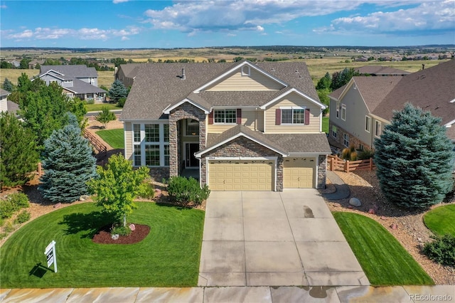 4864 Harness Ct, Parker, CO 80134 - traditional home with stone siding, driveway, an attached garage, and a shingled roof