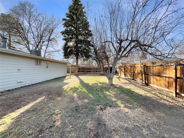 view of yard featuring a fenced backyard