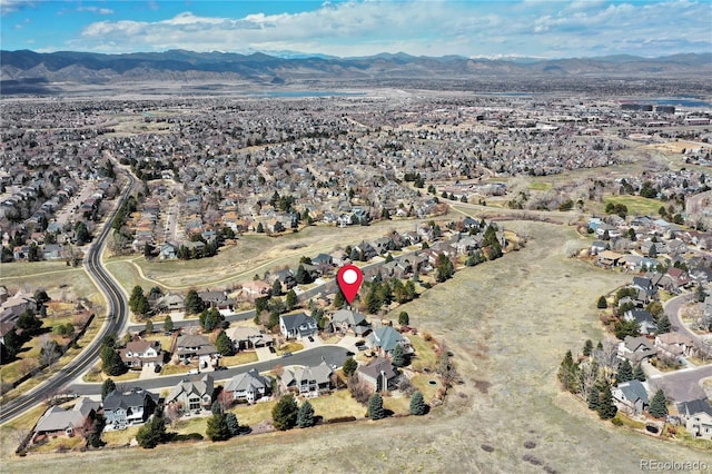 drone / aerial view featuring a mountain view