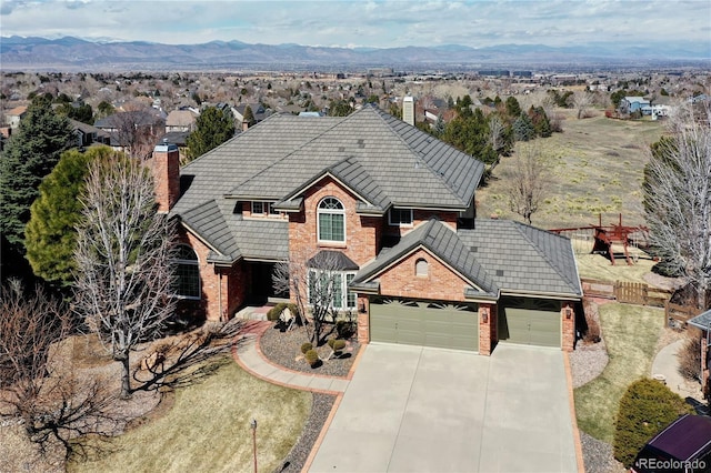 view of front of property with a mountain view