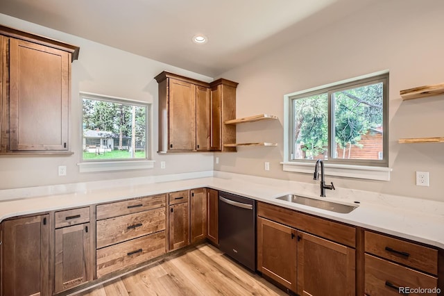 211 E Pikes Peak Ave, Woodland Park, CO 80863 - kitchen with dishwasher, open shelves, light wood-style flooring, light countertops, and recessed lighting