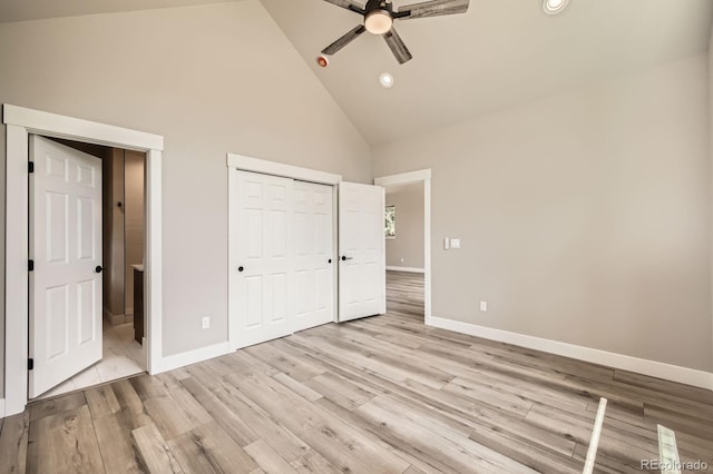 211 E Pikes Peak Ave, Woodland Park, CO 80863 - unfurnished bedroom with high vaulted ceiling, light wood finished floors, recessed lighting, a closet, and ceiling fan